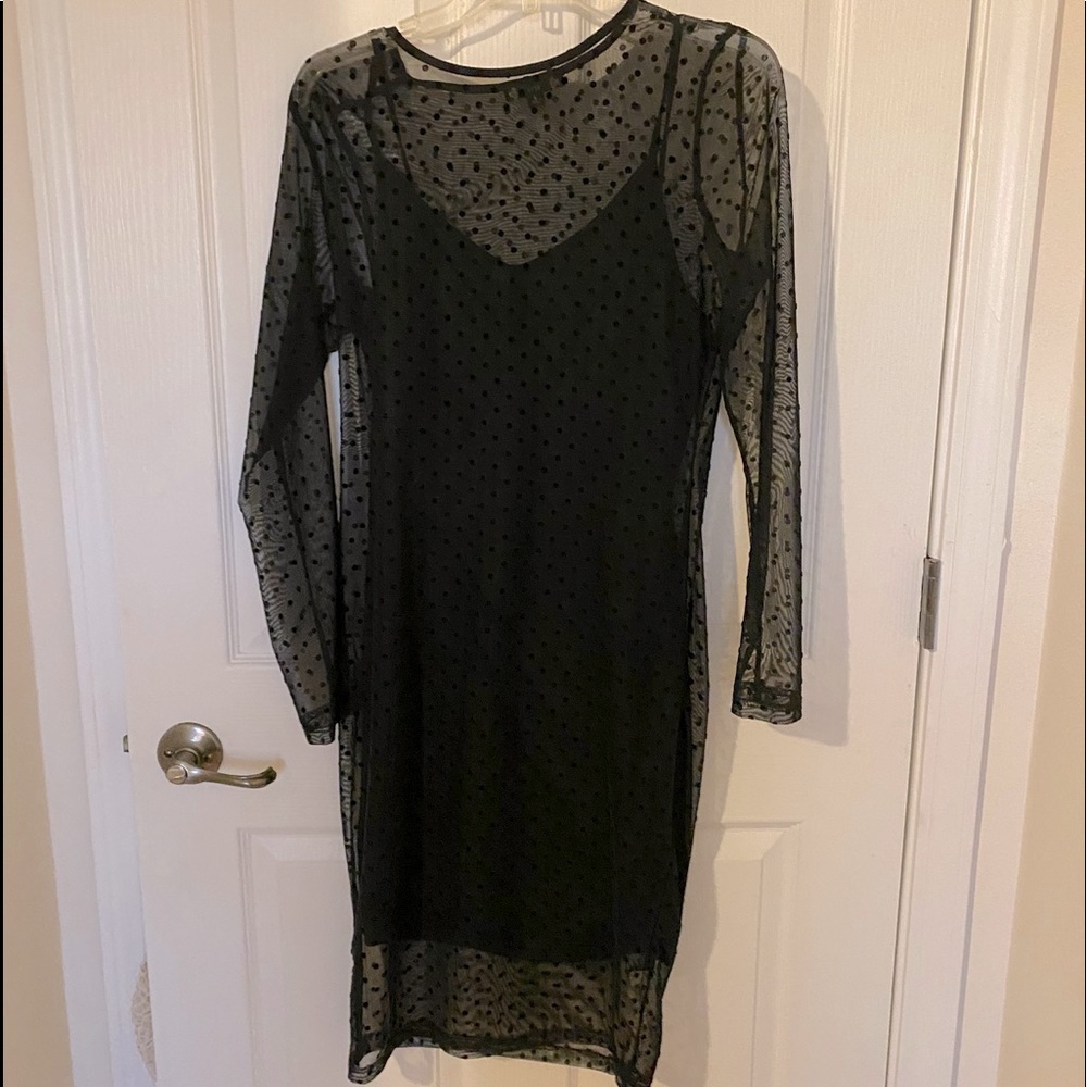 Fits body nicely. Has black slip under